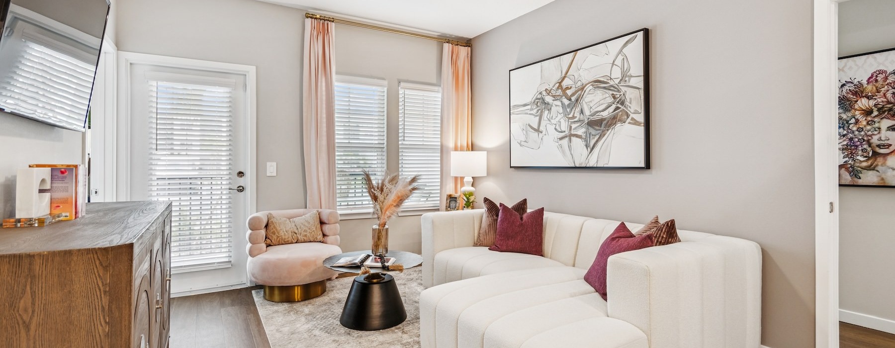 a living room with a couch and a table