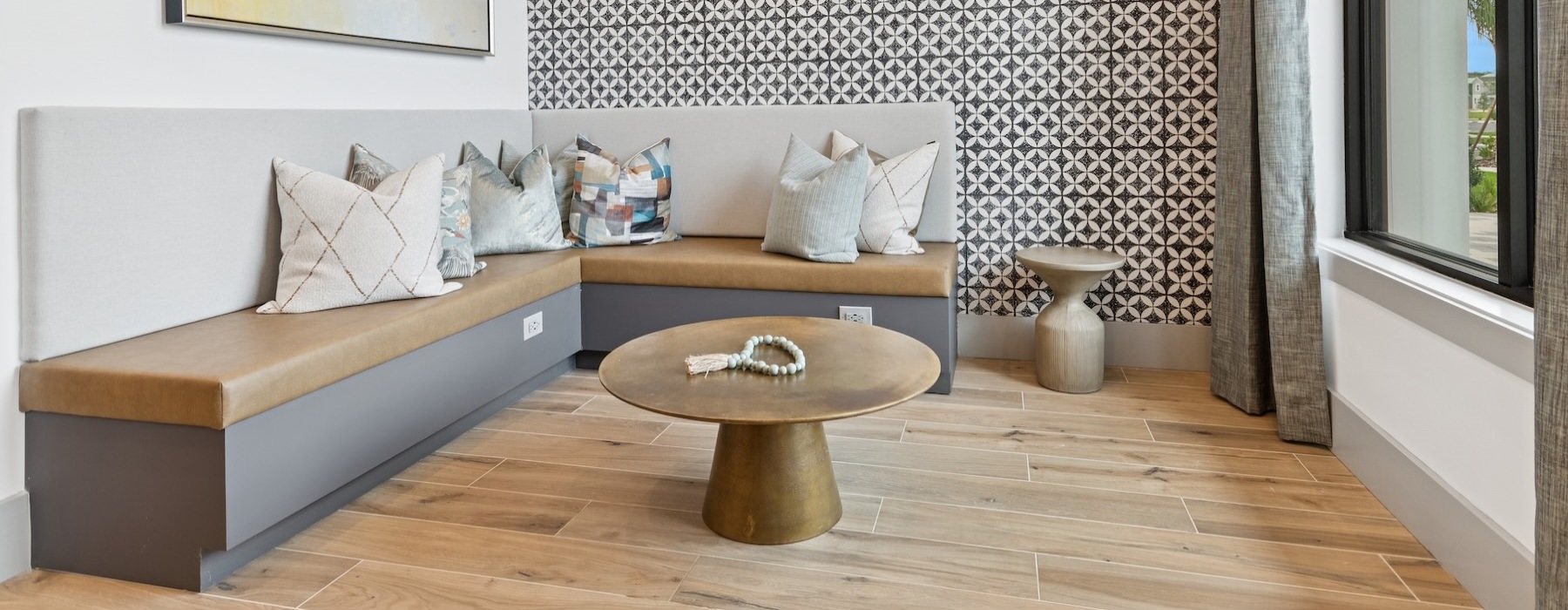 a club room with a couch and a table