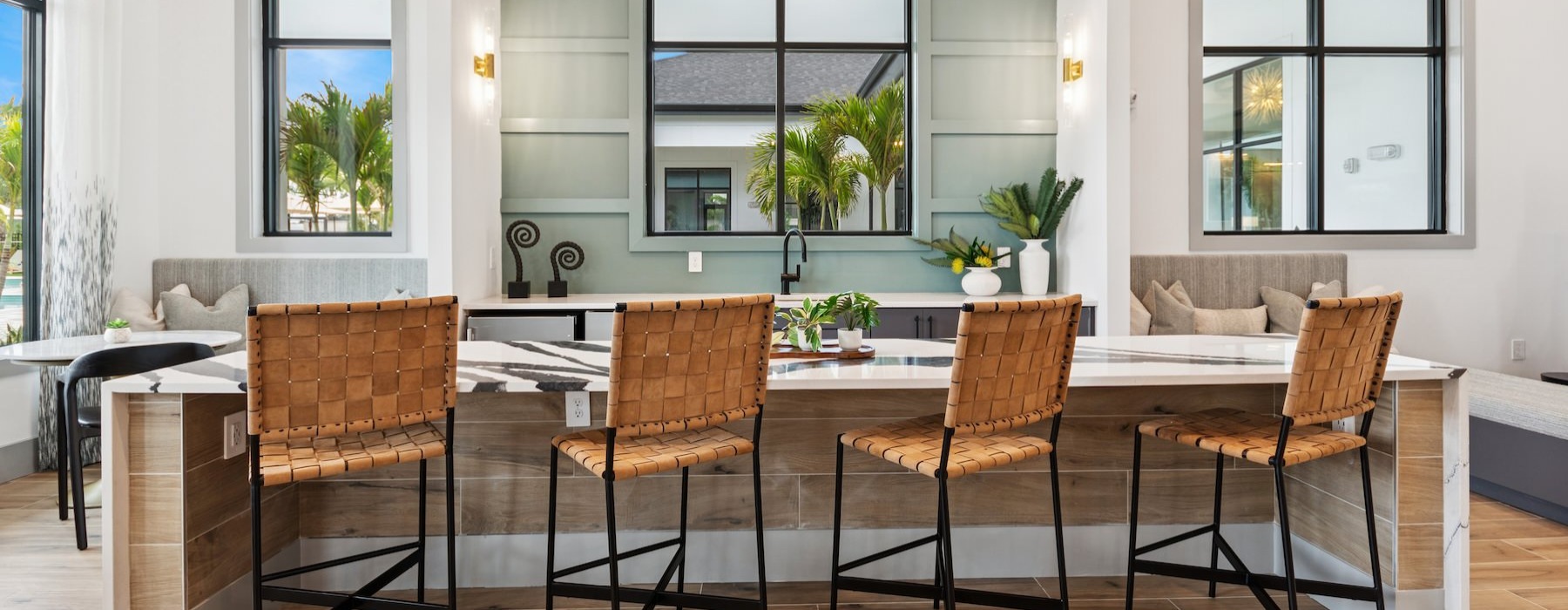 a clubroom with a large table and chairs