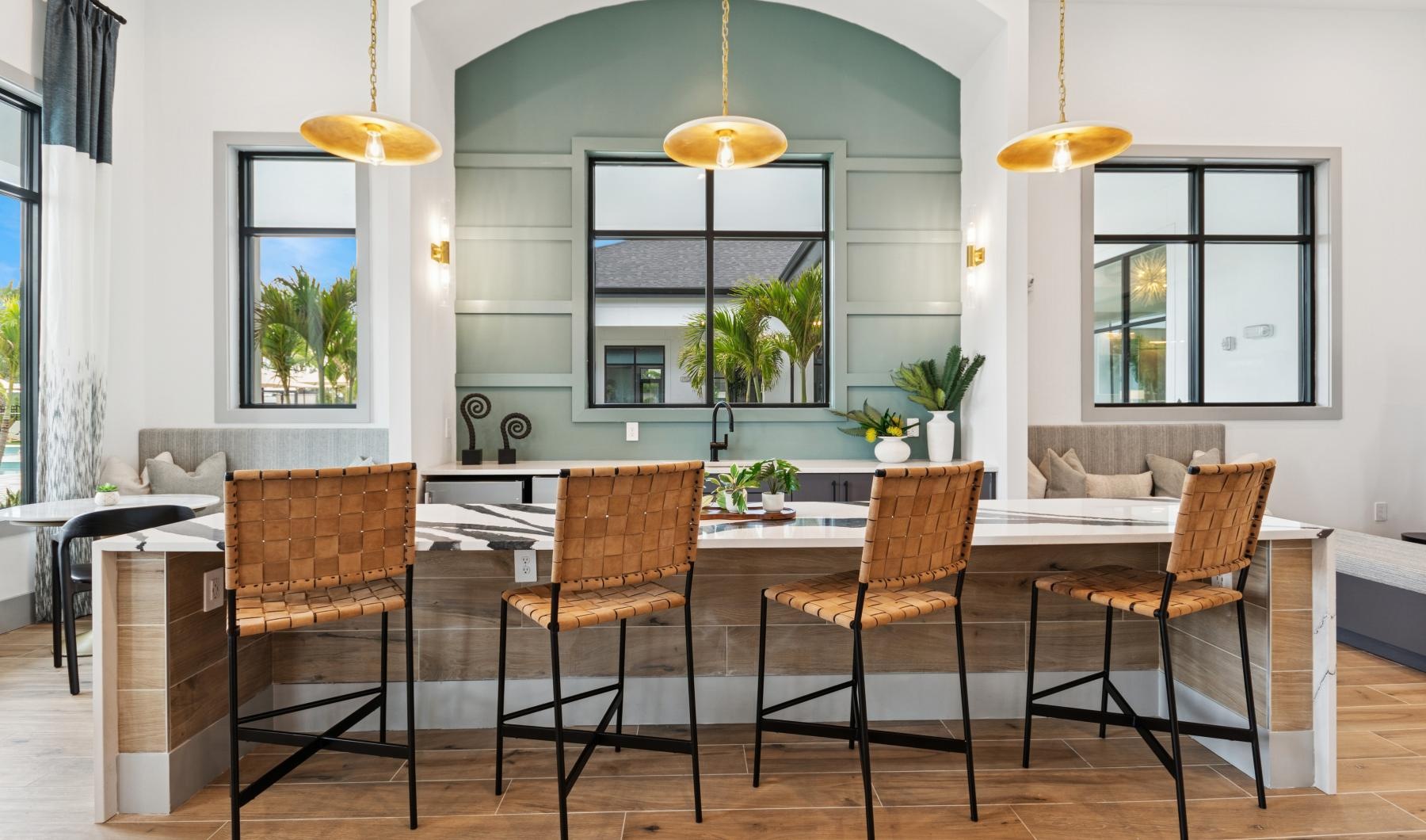 a clubroom with a large table and chairs